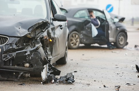 A car is wrecked following a road accident