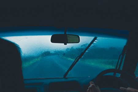 Drving through heavy rain with low visibility